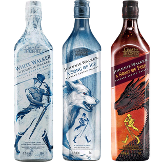 Bottle of Hall of Champions Distillery liquor with a black cap on a white background