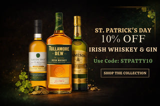Three bottles of Irish whiskey with promotional text for St. Patrick's Day on a dark background.