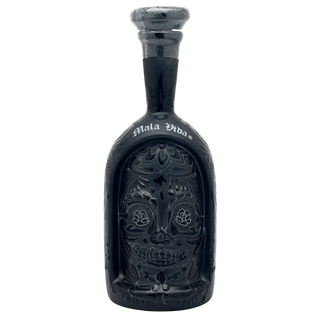 Black bottle with skull design and 'Mala Vida' branding on a white background
