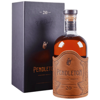 Pendleton whiskey bottle with leather wrap and box on a white background