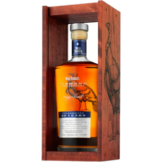 Bottle of Wild Turkey Diamond 60 Years bourbon in a wooden case on a white background